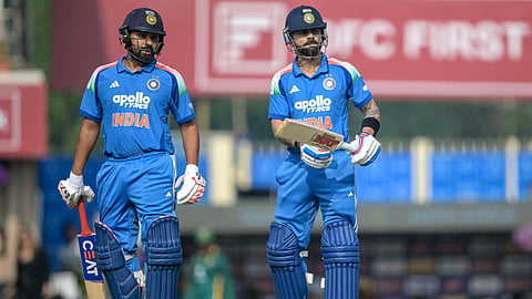 India's Virat Kohli (R) and Rohit Sharma.