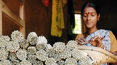 A worker preparing beedis in Agartala, Tripura
