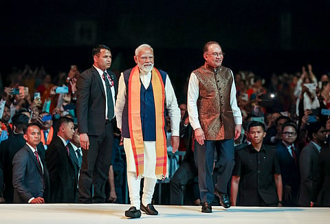 Prime Minister Narendra Modi and Malaysian Prime Minister Anwar Ibrahim during an Indian community event in Malaysia. 