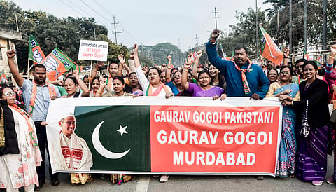 BJP members shout slogans during a protest against Assam Pradesh Congress Committee president Gaurav Gogoi over alleged links to Pakistan, in Guwahati, Sunday, Feb. 8, 2026.