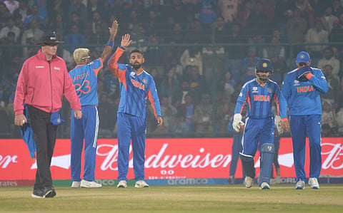 Varun Chakravarthy, (3rd from L) was the pick amongst the India bowlers