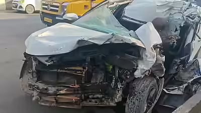 A Kia Seltos car, coming from the Ghaziabad side, had collided with container truck near the toll booths, a senior police officer said.