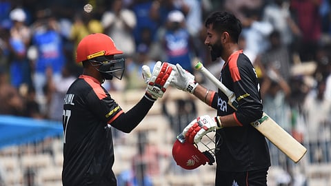 Canada team batsman yuvaraj Samra plays  celebrates his century against Newzealand at the T20 world cup match at MAC in chennai.