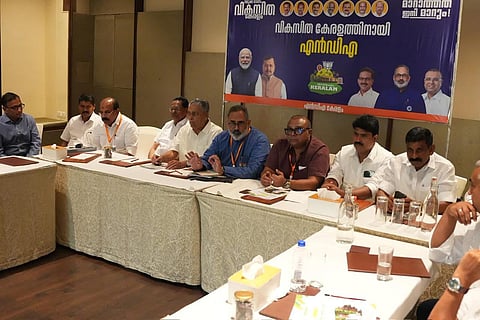 BJP state president and NDA chairman Rajeev Chandrasekar along with NFP leaders George J Mathew and MV Mani at a leadership camp of the alliance in Ernakulam on Monday, February 16, 2026. 