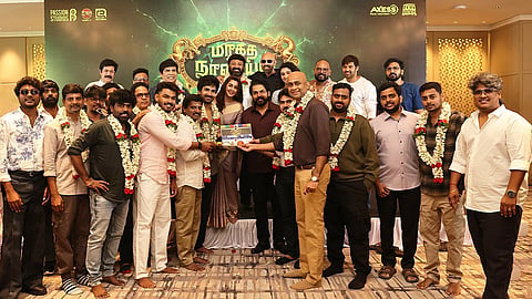 A still from the Poojai ceremony for Maragadha Naanayam 2
