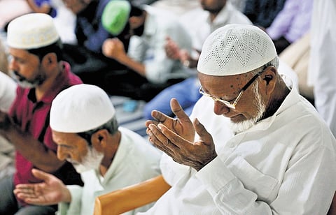 Members of the Muslim community offer Taraweeh prayers at Masjid-e-Subhani in Somajiguda, Hyderabad after the Ramzan crescent was sighted on Wednesday.