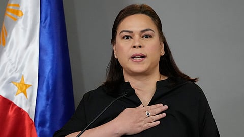 Philippine Vice President Sara Duterte gestures as she announces her intention to run for president in the next elections during a press conference on Wednesday, Feb. 18, 2026, in Manila, Philippines. 
