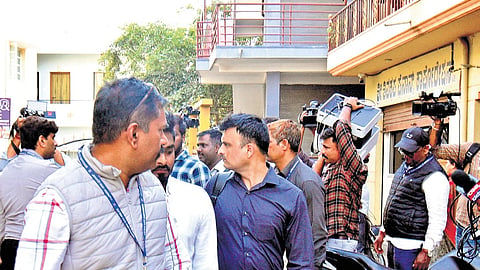 CCB police take custody of evidence during the raid at RTI activist Snehamayi Krishna’s residence and office in in Bandipalya, Mysuru, on Friday 