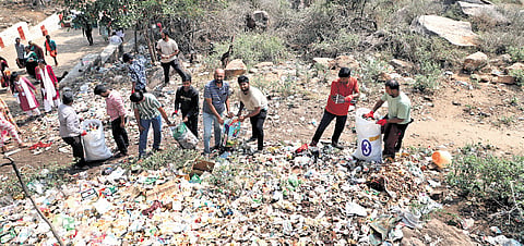 Volunteers climb Velliangiri hill, collect plastic waste & bring them back to the foothills 
