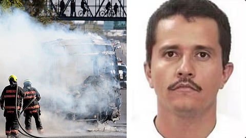 Firefighters extinguish a burning bus set on fire by organised crime groups in response to an operation in Jalisco to arrest a high-priority security target, at one of the main avenues in Zapopan, state of Jalisco, Mexico, on February 22, 2026. 