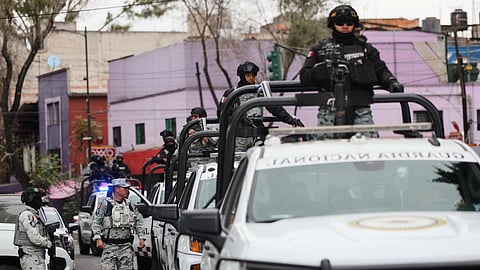 National Guards patrol the area outside of the General Prosecutor's headquarters in Mexico City, Sunday, Feb. 22, 2026, after authorities reported that the Mexican Army killed Jalisco New Generation Cartel leader Nemesio Oseguera, known as "El Mencho."