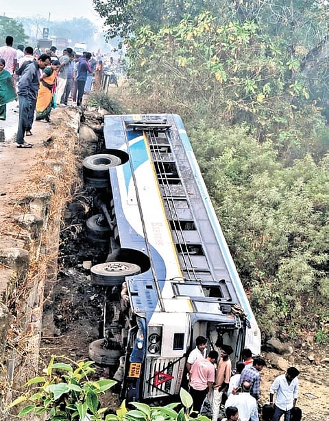 An RTC bus fell-off a bridge in Adilabad on Monday 