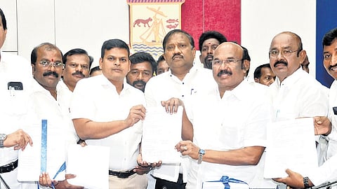 District election officer J Kumaragurubaran releasing the final voters’ list in front of political party representatives at Ripon Building on Monday 