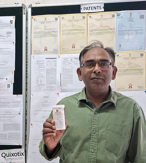 Prof. Devendra Verma holding StopBleed.