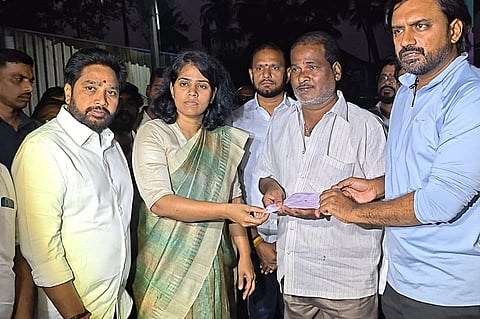 City MLA Adireddy Srinivas and Collector Keerthi Chekuri handed over cheques to the bereaved families. 