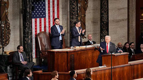 Vice President JD Vance, left, and House Speaker Mike Johnson applaud President Donald Trump during his State of the Union address to a joint session of Congress in the House chamber at the U.S. Capitol in Washington, Tuesday, Feb. 24, 2026.