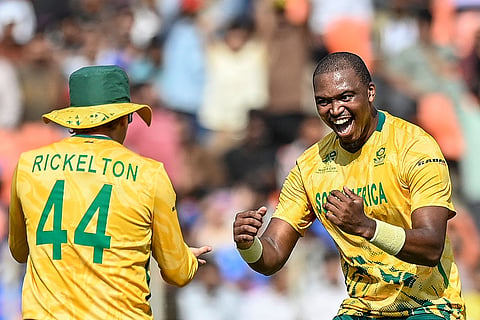 Lungi Ngidi (R) rejoices after taking a wicket on Thursday