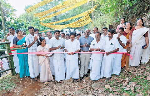 Water Resources Minister Roshy Augustine inaugurating the Palkkulam Medu tourism centre in Idukki 