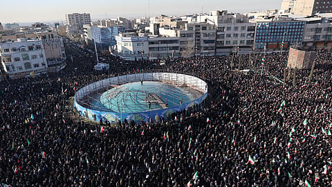 Government supporters gather in mourning after state TV officially announced the death of Iranian Supreme Leader Ayatollah Ali Khamenei in Tehran, Iran, Sunday, March 1, 2026.