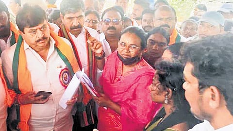 State BJP president N Ramchander 
Rao interacts with displaced 
families at Velugumatla on Sunday