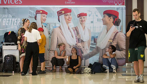 Stranded travelers wait as flights to the Middle East are cancelled following the attack on Iran by the U.S. and Israel, at Ngurah Rai International Airport in Kuta, Bali, Indonesia on Sunday, March 1, 2026.