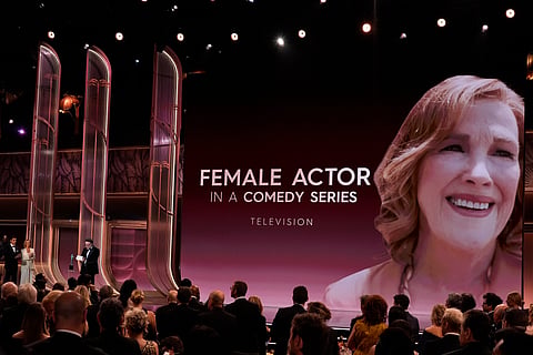 Seth Rogen accepts the award for outstanding performance by a female actor in a comedy series for "The Studio" on behalf of Catherine O'Hara during the 32nd Annual Actor Awards on Sunday.