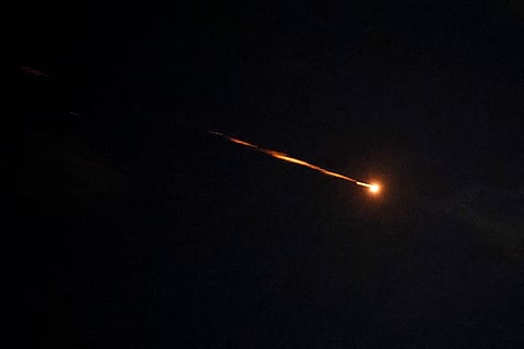 The news agency said missile fragments landed in multiple locations across the West Bank, including within the city of Hebron, after Israel's military reported another round of Iranian missile launches.