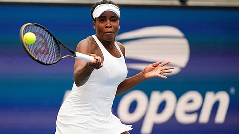 Venus Williams returns a shot to Lyudmyla Kichenok, of the Czech Republic, and Ellen Perez, of Australia, during a first round women's doubles match of the U.S. Open tennis championships, Thursday, Aug. 28, 2025, in New York. 
