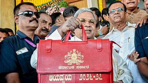 Karnataka Chief Minister Siddaramaiah, who also holds the Finance portfolio, arrives to present the state Budget for the financial year 2026-27, at Vidhana Soudha, in Bengaluru, Friday, March 6, 2026. 