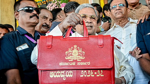 Karnataka Chief Minister Siddaramaiah, who also holds the Finance portfolio, arrives to present the state Budget for the financial year 2026-27, at Vidhana Soudha, in Bengaluru, Friday, March 6, 2026. 