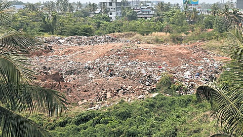 Tonnes of pongala waste, including plastic, dumped by the corporation on the KSRTC-owned land at Enchakkal 