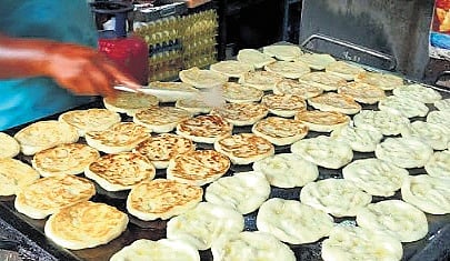 Dishes like porotta and chapathi, which require continuous high-flame cooking, have been temporarily halted in some eateries. 