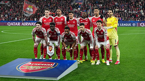 Arsenal players pose before the Champions League round of 16 first leg soccer match between Bayer Leverkusen and Arsenal FC in Leverkusen, Germany, Wednesday, March 11, 2026.