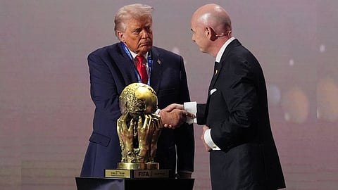 President Donald Trump receives the FIFA Peace Prize from FIFA President Gianni Infantino during the draw for the 2026 soccer World Cup at the Kennedy Center in Washington, Friday, Dec. 5, 2025. 