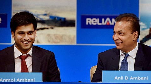 Chairman of Reliance infrastructure Anil Ambani and his son Jai Anmol Ambani during the Reliance capital AGM in Mumbai on Tuesday. 