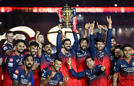 Bengaluru Royal Challengers team with IPL tropy 2025