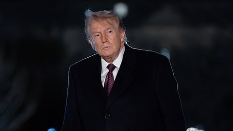 US President Donald Trump walks on the South Lawn upon his arrival to the White House, Sunday, March 15, 2026, in Washington. 