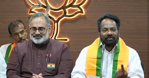 Former KPCC general secretary MJ Job (right) with BJP state president Rajeev Chandrasekar