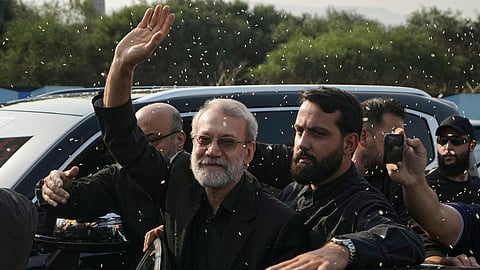 Ali Larijani, center, head of Iran's National Security Council, gestures as Hezbollah supporters throw rice to welcome him outside Rafik Hariri International Airport in Beirut, Lebanon, Wednesday, Aug. 13, 2025. 