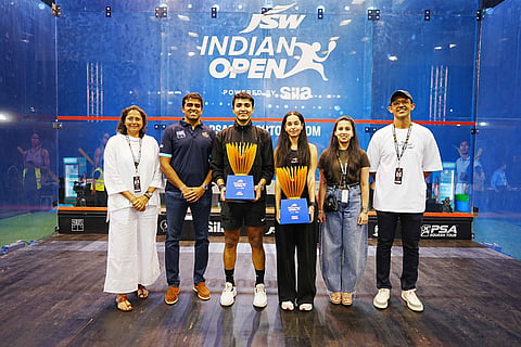 Abhay Singh and Anahat Singh with their trophies on Sunday