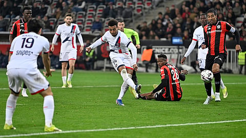 PSG's Desire Doue scores his side's second goal during the French League One soccer match between Nice and Paris Saint-Germain in Nice, France, Saturday, March 21, 2026. 