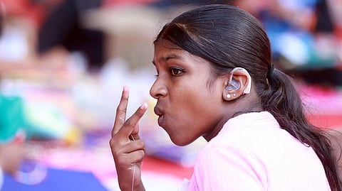 Differently abled students interacting sign languages during the  work experience category at the state school science fair at Alappuzha 