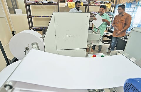 Abdul Hakkim (centre), general secretary, Kerala Federation of the Blind, and other officials inspecting the arrangements for braille dummy ballots at the KFB headquarters in Thiruvananthapuram. 