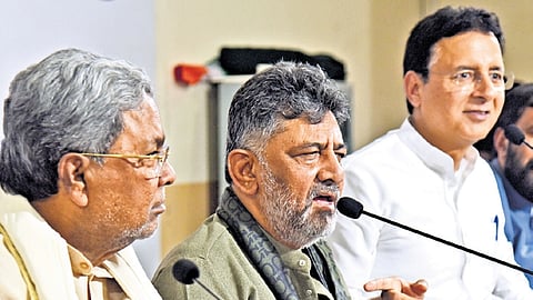 CM Siddaramaiah, Deputy CM DK Shivakumar and AICC General Secretary Randeep Singh Surjewala address the media in Bengaluru on Friday |  Vinod Kumar T