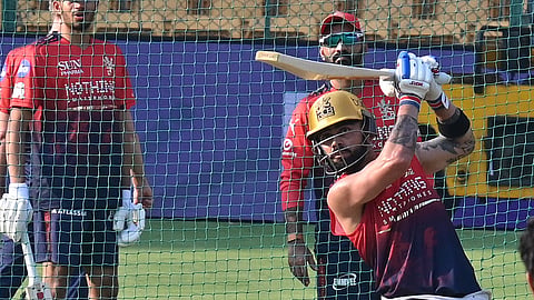 Virat Kohli trains on the eve of the IPL opener between RCB and SRH at the M Chinnaswamy Stadium in Bengaluru, on Friday