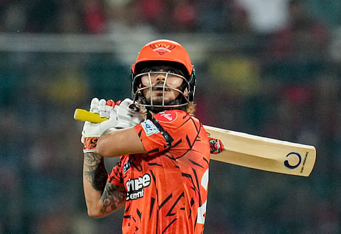Sunrisers Hyderabad's captain Ishan Kishan plays a shot during an Indian Premier League (IPL) 2026 T20 match between Royal Challengers Bengaluru and Sunrisers Hyderabad, at the M Chinnaswamy Stadium, in Bengaluru. 
