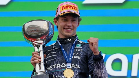 Mercedes driver Kimi Antonelli of Italy reacts on the podium after winning the Japanese Formula One Grand Prix at Suzuka in central Japan, Sunday, March 29, 2026. 