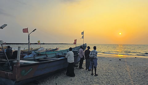 Fishermen at Arthungal harbour preparing to go out to the sea 