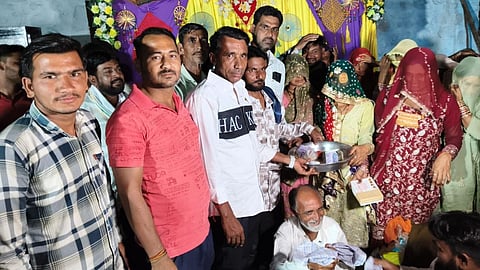 Accompanied by friends and family, Parasaram brought traditional offerings and gifts for Shabana. 