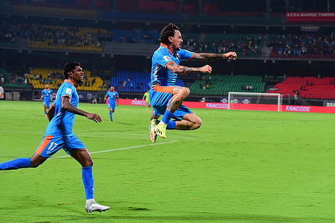 Ryan Williams (C) celebrates his goal on Tuesday